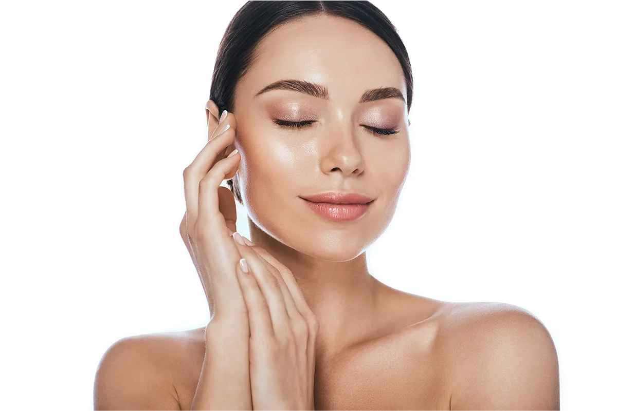 atamé skin care – woman with closed eyes touching her face